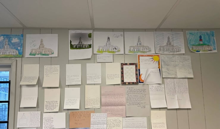 Drawings and colorings from children and thank-you notes from youth and adults are posted on the walls of the Haskell construction trailer on the grounds of the Helena Montana Temple during its construction from late 2021 through early 2023.