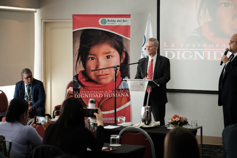 Elder David A. Bednar speaks in a hotel conference room to the Seminario Sudamericano conference in Lima, Peru.