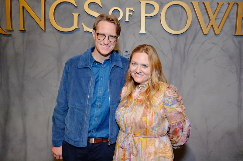 Left, showrunner J.D. Payne and his wife, Rachel Payne, attend a "The Lord Of The Rings: The Rings Of Power" press event in San Diego, California, on July 25, 2024.