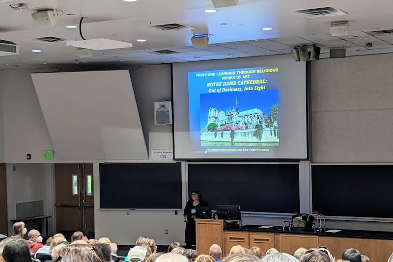 Utah Valley University Museum of Art interim director Rita R. Wright speaks to a BYU Education Week class about temples.