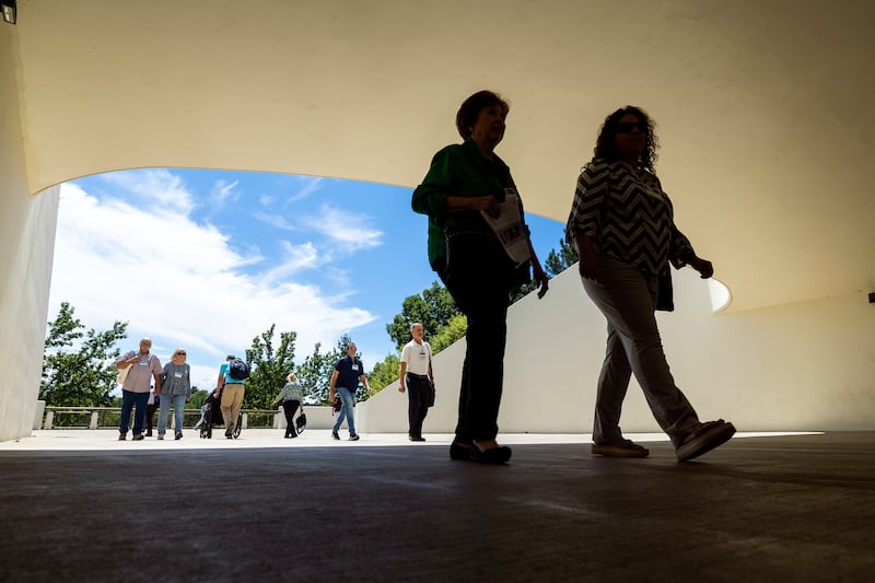 BYU’s Education Week attendees walk between sessions in Provo, Utah, on Monday, Aug. 15, 2022.