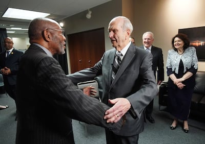 President Russell M. Nelson of The Church of Jesus Christ of Latter-day Saints embraces the Rev. Amos C. Brown at the 110th annual national convention for the National Association for the Advancement of Colored People in Detroit on Sunday, July 21, 2019.