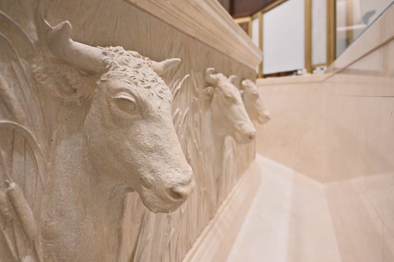 The heads of 12 oxen are found on the base of the baptismal font.